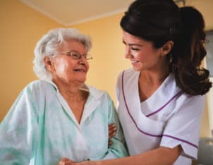 a caregiver woman with an elderly woman