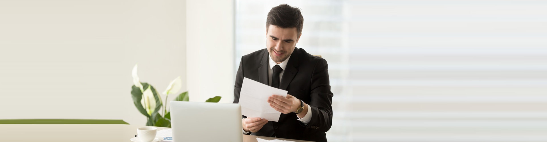 a man reading a paper